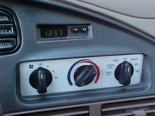 hvac panel with the dash reinstalled, and a new in-dash clock!!