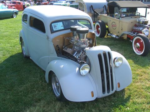 1974 Ford Ranchero - Custom hot rod with exposed engine and dual carburetors at a car show.