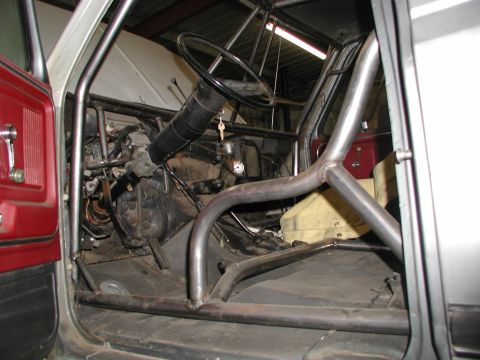 1980 Ford Bronco - cage in front, bend around seat