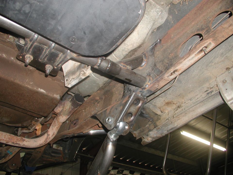 Crossmember attaches to frame