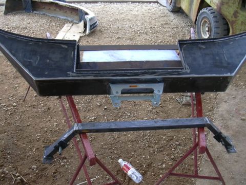 1995 Ford Bronco - A custom front bumper, possibly for an off-road vehicle, is shown mounted on sawhorses with a winch mount integrated into its design.