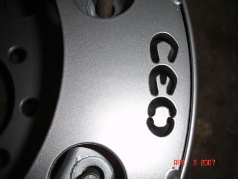 1995 Ford Bronco - Close-up of a silver wheel with the text 'CEC' visible.
