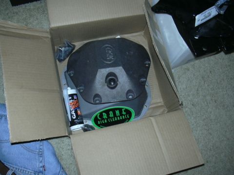 1995 Ford Bronco - New Crane High Clearance differential cover and gasket sealant are unboxed.
