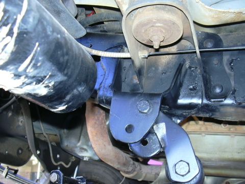 1995 Ford Bronco - Custom suspension bracket installation detail on a vehicle frame.