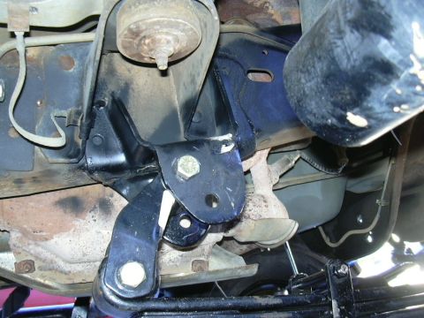 1995 Ford Bronco - Underside view of vehicle suspension components, showing aftermarket parts and modifications.