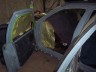 1998 Ford Crown Victoria - Close-up view of car doors, possibly undergoing repair or restoration.