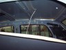 1998 Ford Crown Victoria - The interior of a vehicle is captured, focusing on the headliner and window frames.
