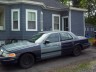 1998 Ford Crown Victoria - This 1998 Ford Crown Victoria features a distinctive two-tone paint job and is viewed from the front three-quarter angle.
