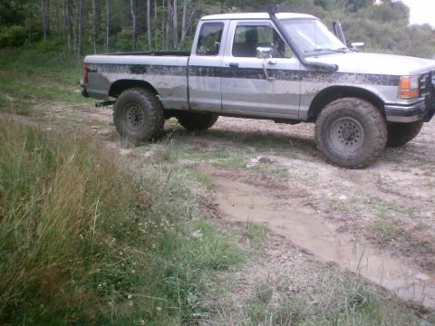 1990 Ford Ranger - This 1990 Ford Ranger pickup truck is equipped for off-road adventures with a snorkel and lifted suspension.
