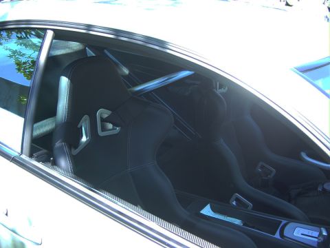 1993 Ford Probe - Interior shot shows racing seats and a roll cage, suggesting performance modifications.