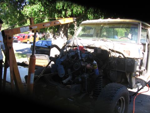1989 Ford Bronco - Engine removal in progress for a truck project.