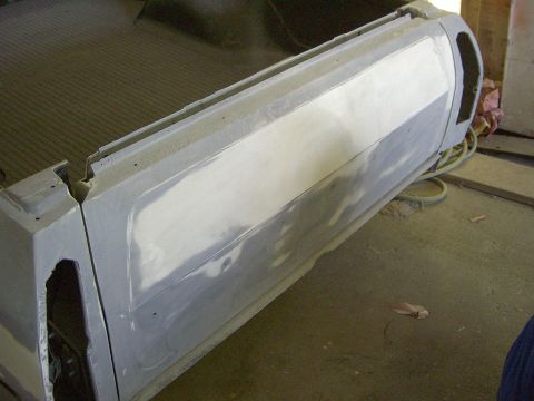1972 Ford Ranchero - Body panels are being prepped for paint, showing areas of filler and primer.