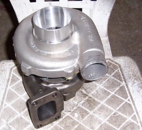 1988 Pontiac Fiero - Turbocharger part with visible AR.60 A/R and .30 markings.