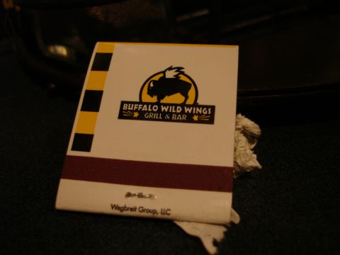 1993 Ford Taurus - A matchbook from Buffalo Wild Wings Grill & Bar is shown.