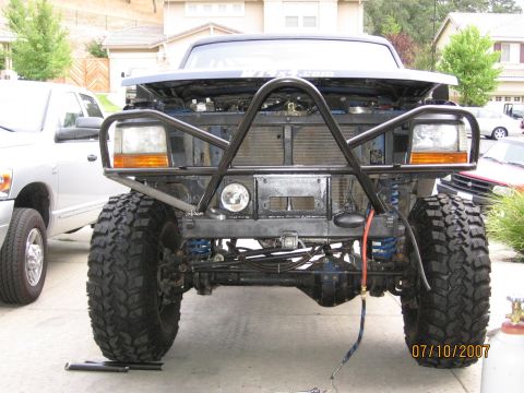 1994 Ford Bronco - Front view of a 1994 Ford Bronco modified with a heavy-duty bumper and off-road tires.