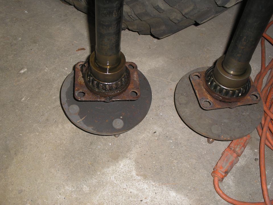 Front axle hubs and bearings on concrete floor