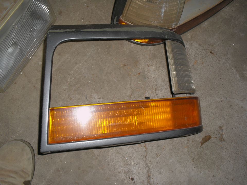 Ford Bronco headlight assembly with amber turn signal and clear marker light