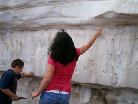 1993 Ford Bronco - Kids writing on a snow bank/wall on the side of the Pike's Peak road