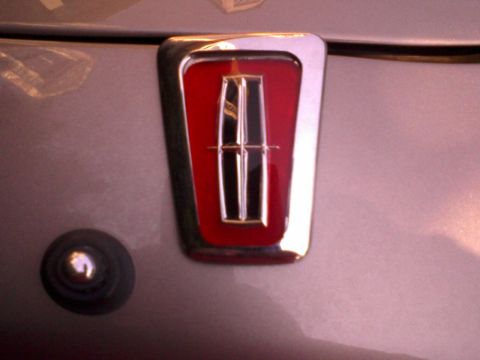 1996 Mercury Grand Marquis - Final result with the chrome film trimmed. This was just resting inside the spare trunk lock cover I had.