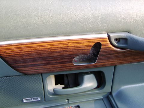 1996 Mercury Grand Marquis - Swapped woodgrain for one with a cutout for seat switch