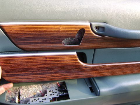 1996 Mercury Grand Marquis - Stock door woodgrain trim piece removed, 8 way power seat switch cutout trim installed