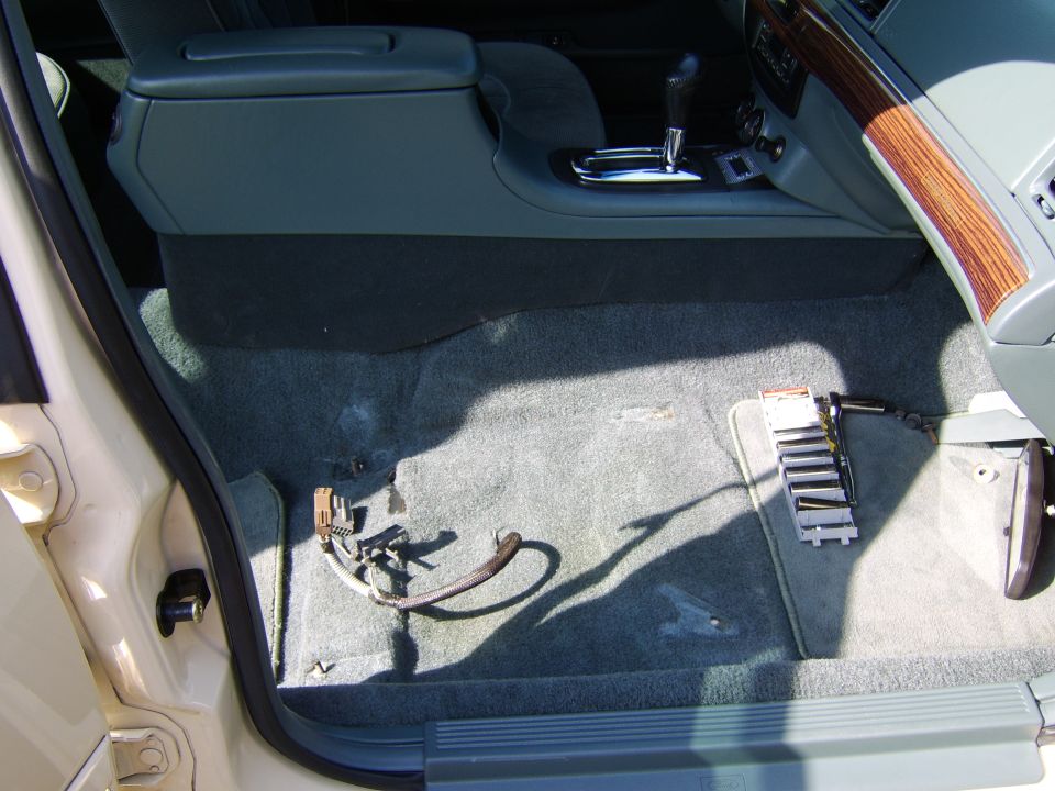 Seat and track removed.


Very clean under there! :cool:

The wiring is the 8way power pre-wire