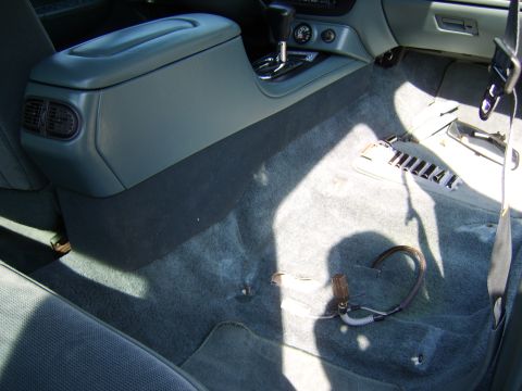 1996 Mercury Grand Marquis - Seat and track removed. Very clean under there! :cool: Notice the floor console fitment to the tunnel
