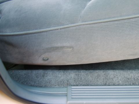 1996 Mercury Grand Marquis - I was left with a hole from the old manual recline lever. To solve that, I used a color-matched push pin in the hole. Works alright. You ca…