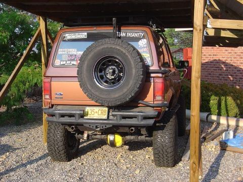 1986 Ford Bronco II - This 1986 Ford Bronco II is equipped with a spare tire on the rear door and a heavy-duty aftermarket bumper.