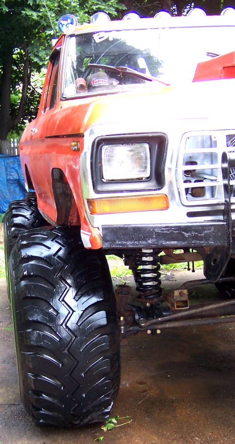 1978 Ford Bronco - This lifted 1978 Ford Bronco features oversized off-road tires and a prominent front grille.