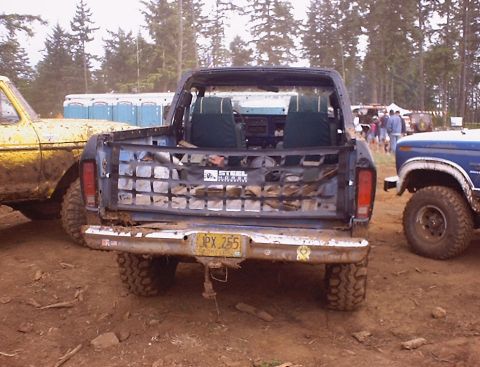1989 Ford Bronco - Jims in madness mode, with the top off, tailgate net on...