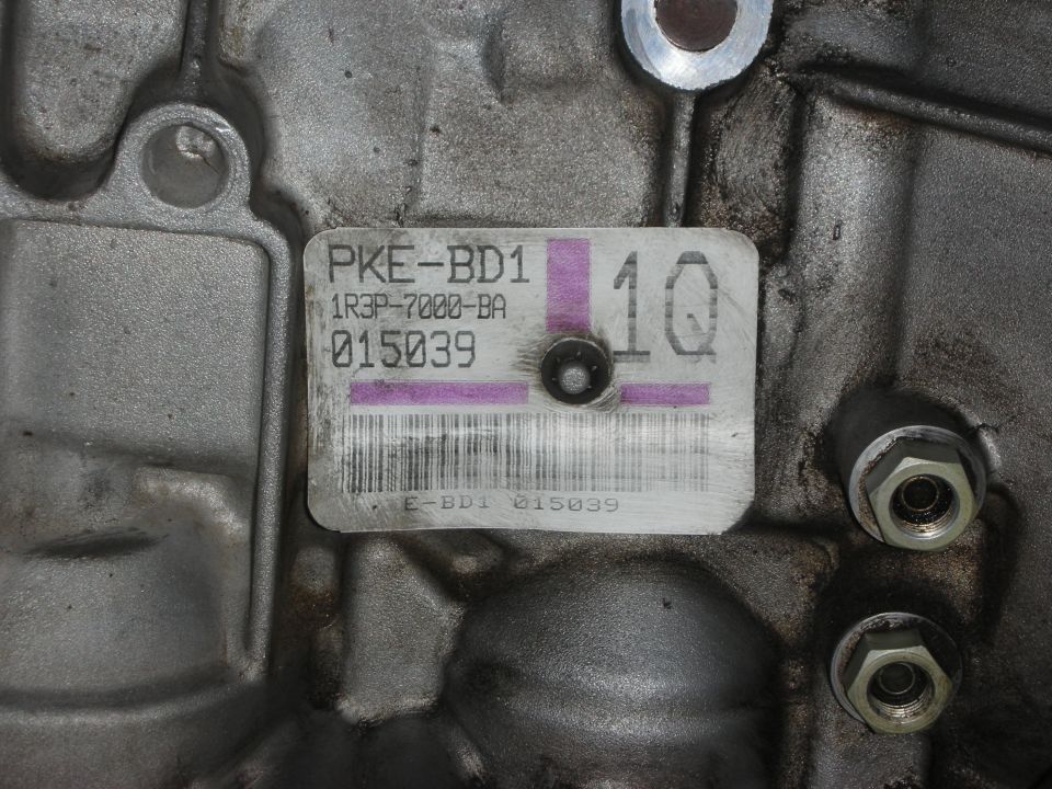 Part label with PKE-BD1, 1R3P-7000-BA, and 015039