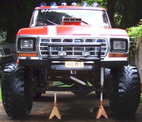 1978 Ford Bronco - This lifted 1978 Ford Bronco features oversized tires, auxiliary lighting, and a prominent hood scoop.