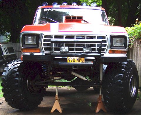 1978 Ford Bronco - This modified 1978 Ford Bronco features a prominent hood scoop and oversized tires.