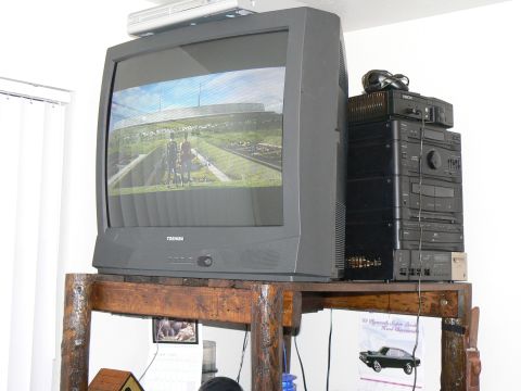 2006 Ford E350 - 33" Toshiba tube TV I got for free at work. Guess how much this thing weights? 120lbs!
