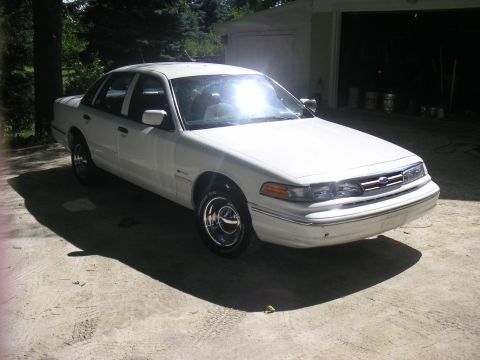 1997 Ford Crown Victoria - This 1997 Ford Crown Victoria is shown from a three-quarter front view, parked outdoors.