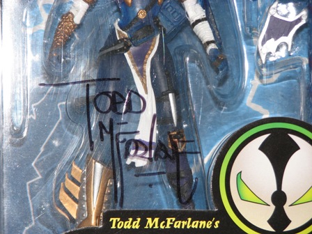 1991 Ford Bronco - Action figure in packaging signed by Todd McFarlane.