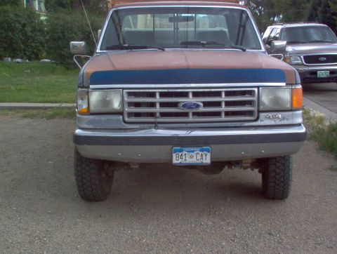 1993 Ford Bronco - This 1993 Ford F-Series truck is seen from the front, a blue grille and a Colorado license plate.