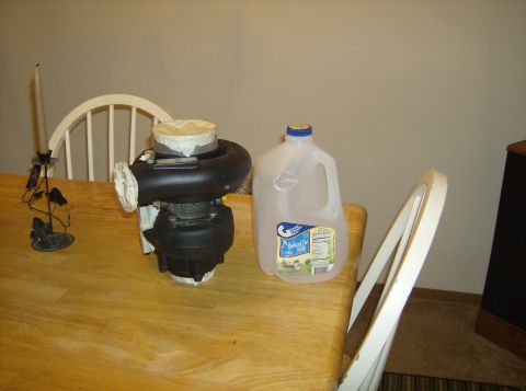 1996 Ford Probe - Turbocharger and milk jug on a table. Album claims 1996 Ford Probe.