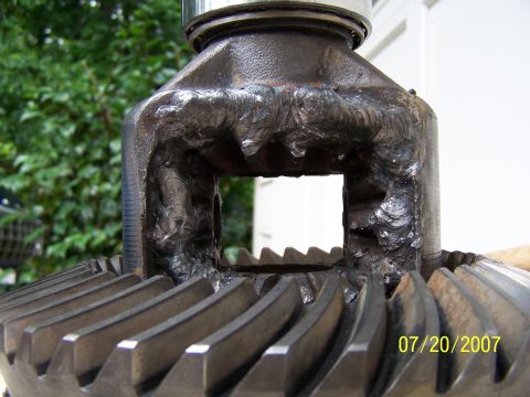 1979 Ford F-150 - Close-up of a heavily welded differential gear housing with a date stamp.
