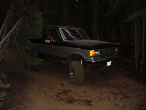 1989 Ford Bronco - Around a tree with the boy riding shotgun