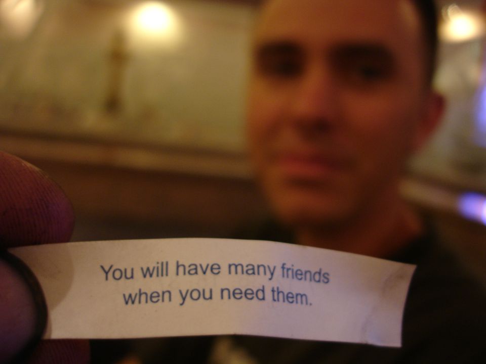 fortune cookie paper with text 'You will have many friends when you need them.'