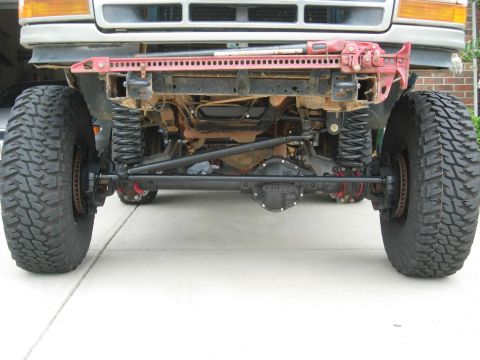 1995 Ford Bronco - This vehicle has a modified front axle and suspension system, large tires and a high-lift jack.