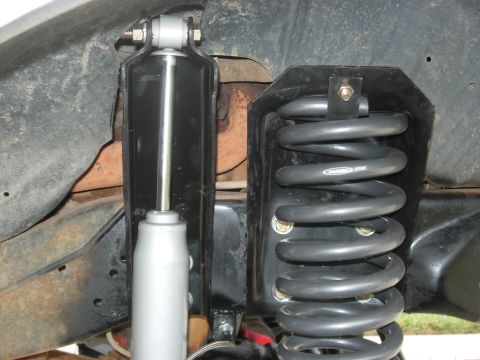 1995 Ford Bronco - Suspension components, including a shock and coil spring, are visible in this close-up shot.