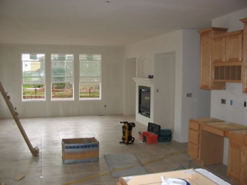 1995 Ford Bronco - This is an interior scene of a house that is currently under construction, showing unfinished elements of a kitchen and living area.