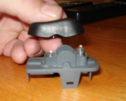 1999 Ford Crown Victoria - The Rocker part of the switch goes on one way. The thicker part goes over the raised LED for re-assembly