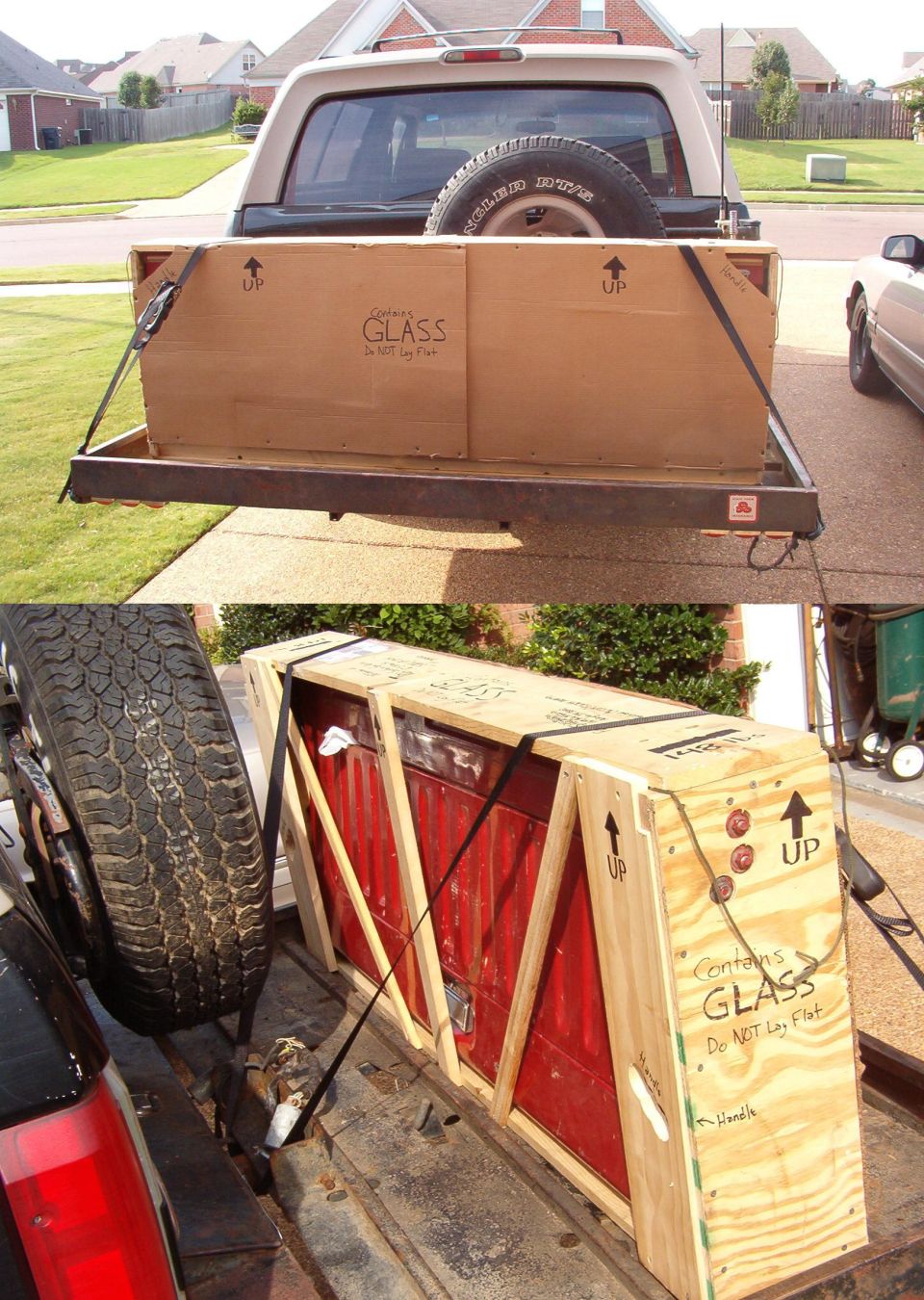 Plywood glass crates strapped to a hitch carrier behind a pickup truck