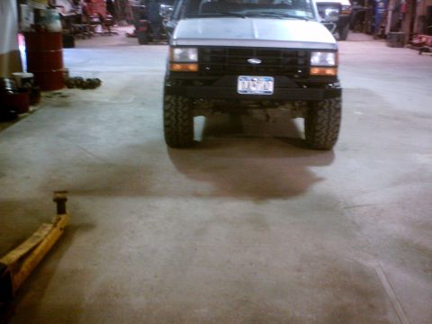1990 Ford Ranger - The front view of a 1990 Ford Ranger shows its grille, bumper, and license plate.