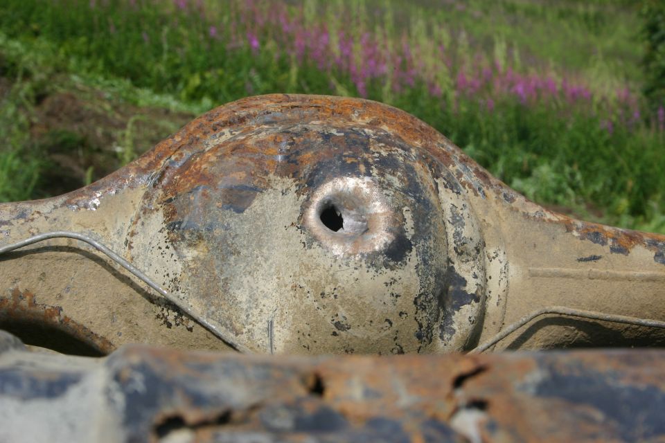 Rusted differential housing with a hole in the center