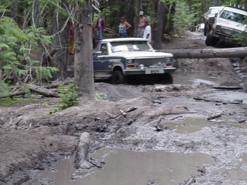 1989 Ford Bronco - Todd coming thru the mud on the "wussy" trail